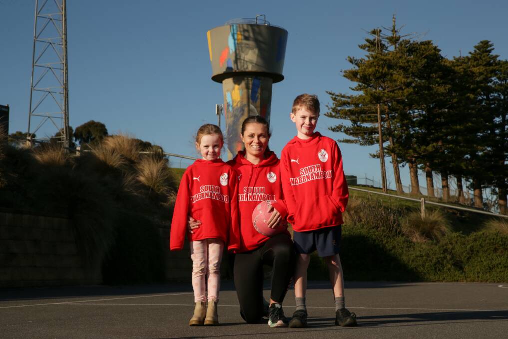 LOYAL: South Warrnambool's Sarah O'Donnell, pictured with her kids Claudia, 5 and Eddie, 7, reaches game 300 on Saturday. Picture: Chris Doheny