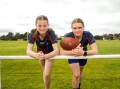 Molly Kavenagh, 14, and Annabelle Glossop, 16, are among Terang Mortlake's budding female footballers. Picture by Anthony Brady