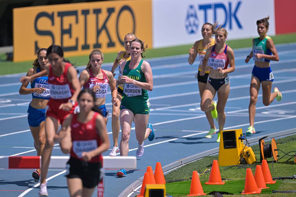 PUSHING THROUGH: Timboon's Emily Morden (middle) in action during the Under 20 World Athletics Championships on Monday. Picture: Getty Images