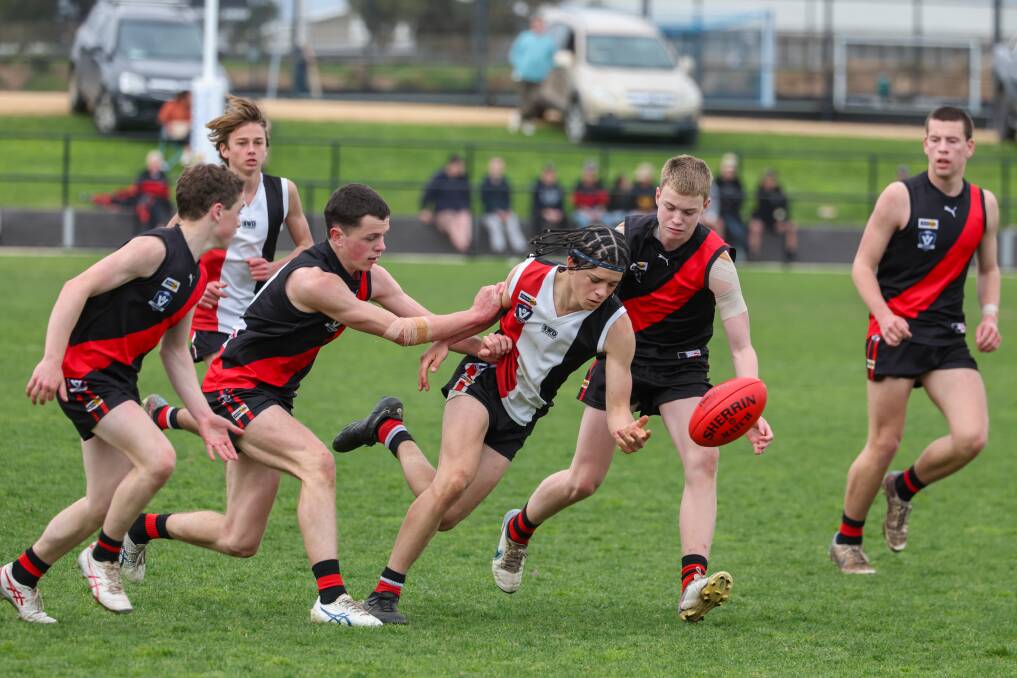 Des O'Keefe, pictured playing in Koroit's under 16 grand final win, splits his time between basketball and football. Picture by Eddie Guerrero