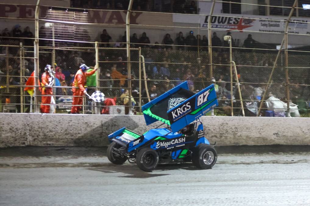 Aaron Reutzel crosses the finish line to take out the 51st Grand Annual Sprintcar Classic. Picture by Eddie Guerrero.