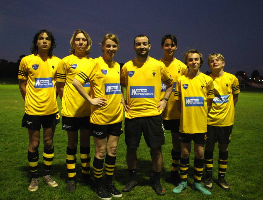 Wolves' under 16 co-captains Will Hammond and Oscar Cooke, women's player Brooke Gent, men's coach Corrie Shields and under 14 co-captains Gabe Lim, Julian Cooke and Matthew Callaghan. Picture by Meg Saultry