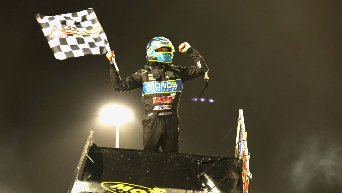 Albury's Grant Anderson waves the chequered flag after winning the 2023 edition of Max's Race at Premier Speedway. Picture by Sean McKenna