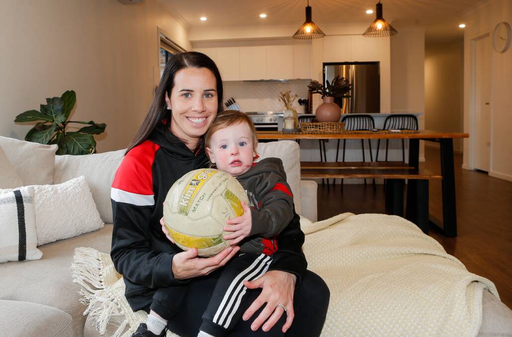 INSPIRED: Emily-Rose Dobson, pictured with son Freddie, 15 months, ahead of her 100th club game for Koroit on Saturday. Picture: Anthony Brady