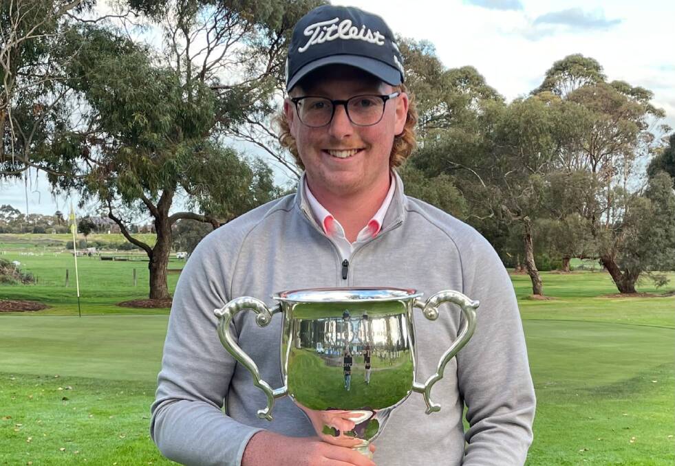 SILVERWARE: George Beasley after winning the Marc Leishman Trohpy on Sunday. Picture: Supplied.