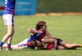 Hugh Porter, pictured tackling North Warrnambool's Luke Kenna, has joined Nirranda from Hampden league club Terang Mortlake. Picture by Eddie Guerrero
