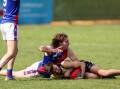 Hugh Porter, pictured tackling North Warrnambool's Luke Kenna, has joined Nirranda from Hampden league club Terang Mortlake. Picture by Eddie Guerrero