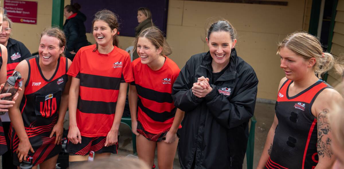 An estatic Sophie Hinkley (second from right) on Saturday after Cobden advanced to a grand final. The coach had newborn Annabel two days later. Picture by Edgar Guerrero