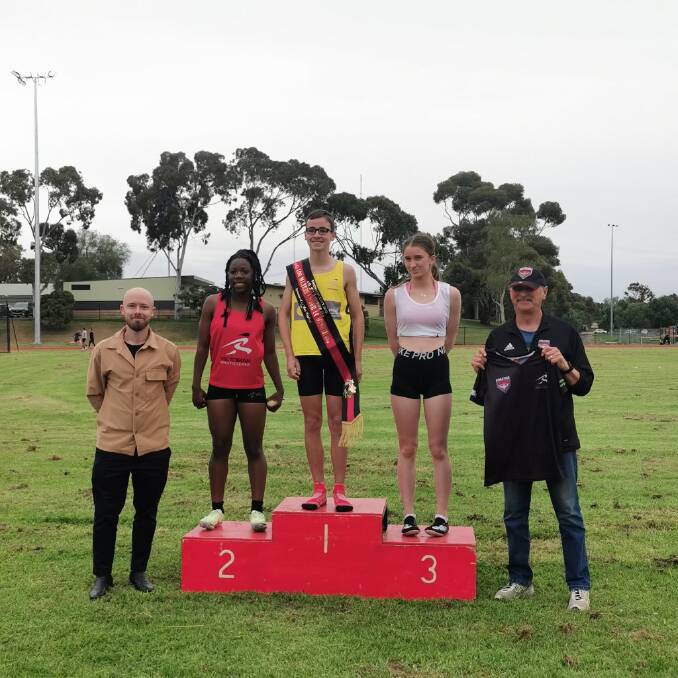 Hannah McMeel (second from right) finished third in the under-14 100-metre gift at Essendon on Saturday.