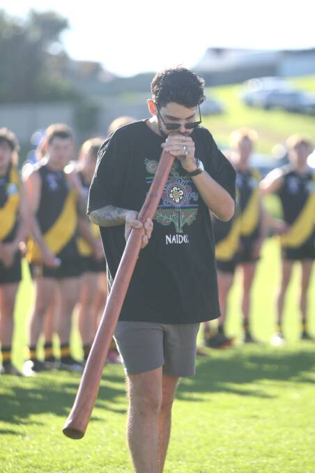 COUNTRY: Levi Geebung plays the didgeridoo during a traditional Welcome to Country prior to the senior match. Picture: Meg Saultry