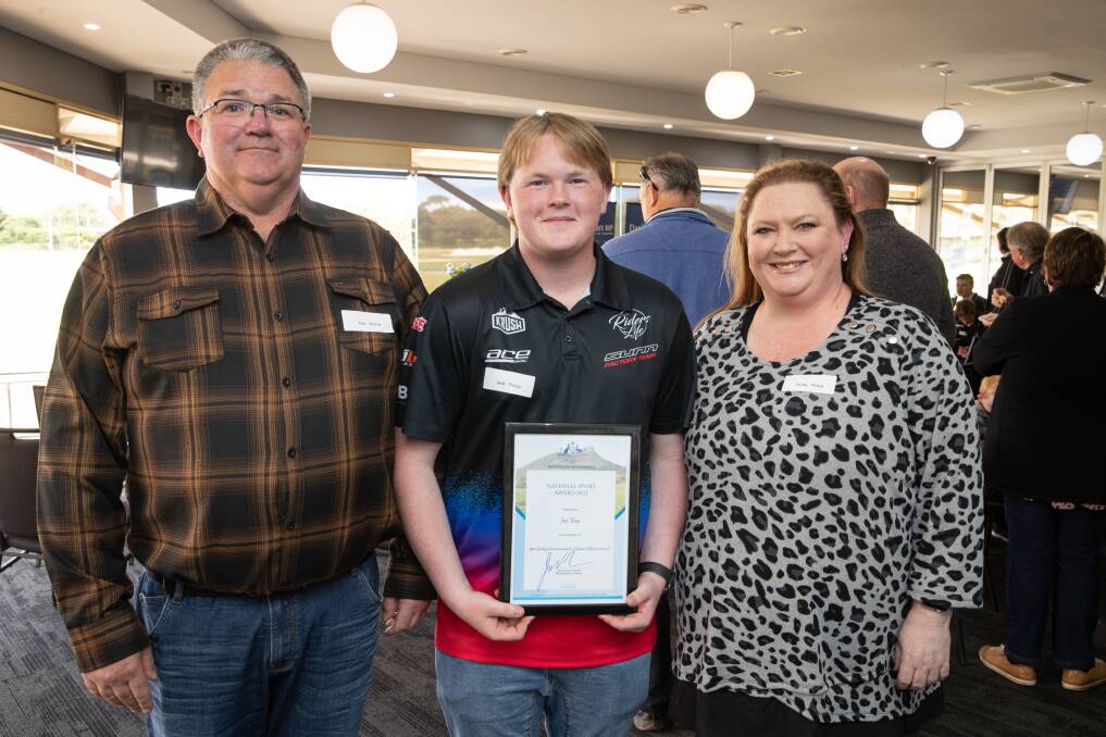 Jack Thorp (middle) with parents Tim and Trudy. Tim was awarded a volunteer achievement award on Thursday for his work with Portland BMX Club. Picture by Sean McKenna