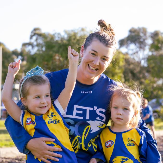 Kim Wines, with daughters Isla 4, and Amelia, 2, holds a special connection with North Warrnambool Eagles. Picture by Sean McKenna