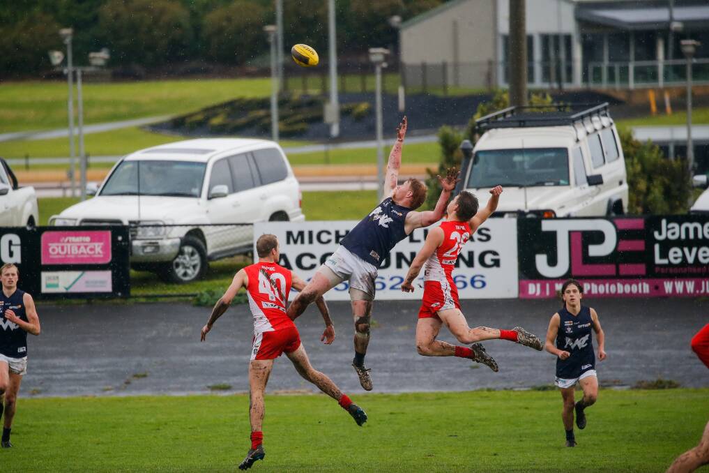HIGH FLYER: Harry Ryan launches during the South Warrnambool and Warrnambool game. Picture: Anthony Brady