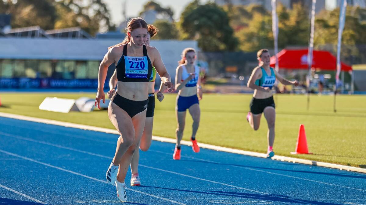 SHE'S DONE IT: Warrnambool's Grace Kelly crosses the line first in the under-17 200m Victorian championships final. Picture: Ryk Neethling