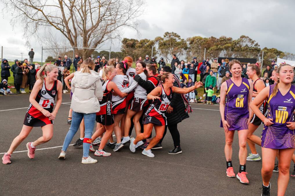 Koroit celebrates after winning the grand final with a shot after the siren. Picture by Rob Gunstone