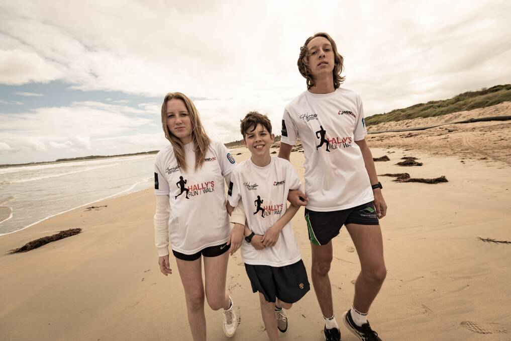 Ella, 13, Jack, 10, and Will, 15, ahead of Hally's run, a fun run in honour of their late father Clinton Hall. Picture by Sean McKenna