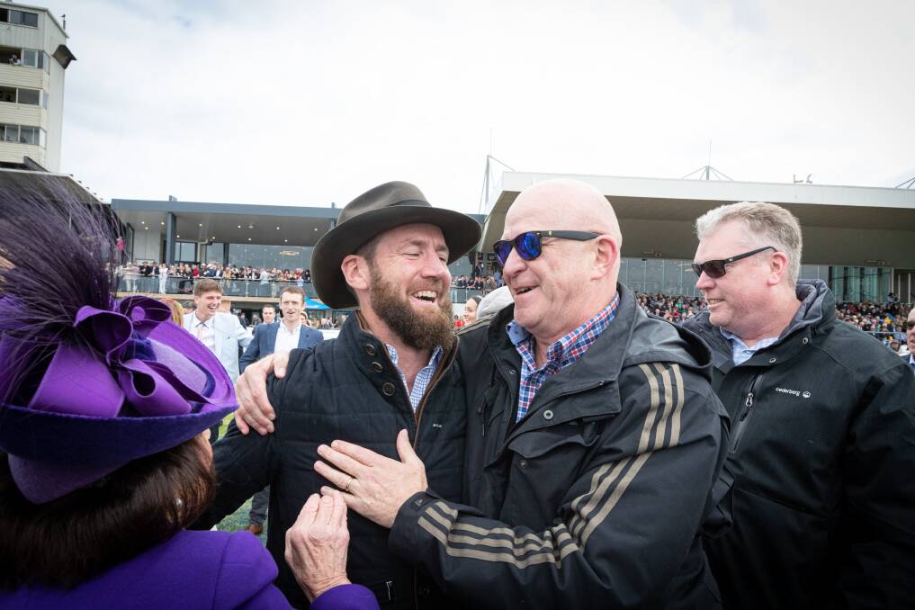 Trainer Ciaron Maher is surrounded after winning his seventh Grand Annual Steeplechase on Thursday. Picture by Sean McKenna.