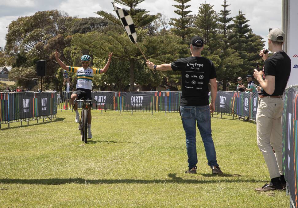 Canberra's Brendan Johnston crosses the line first in the inaugural Dirty Warrny's elite men's long course category. Picture by Sean McKenna.