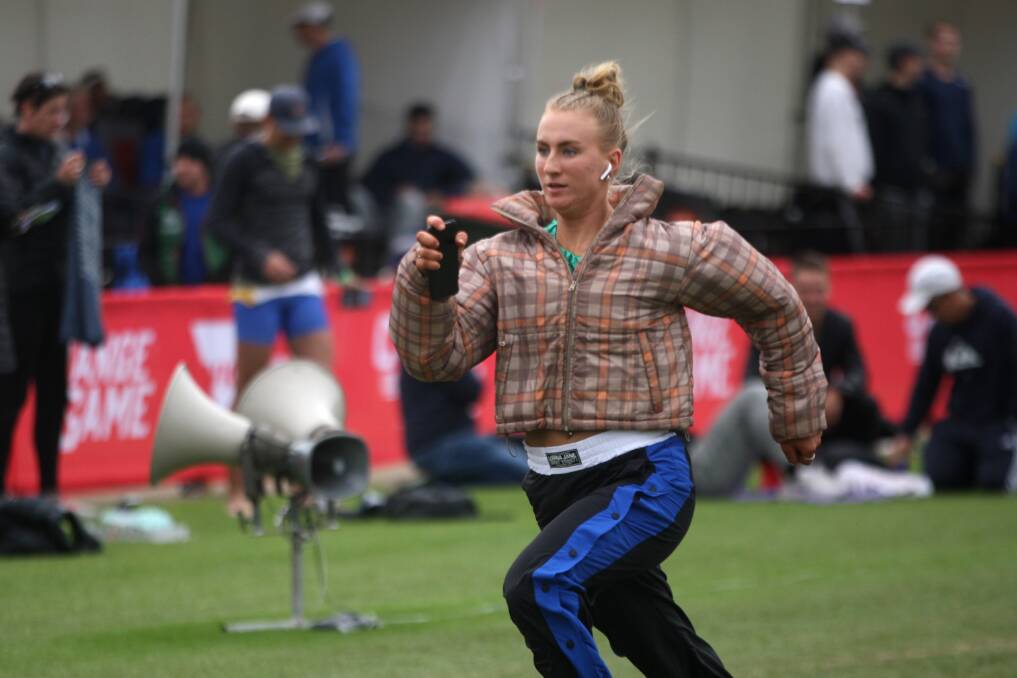 Layla Watson warms up ahead of the Stawell Gift final. Picture by Meg Saultry