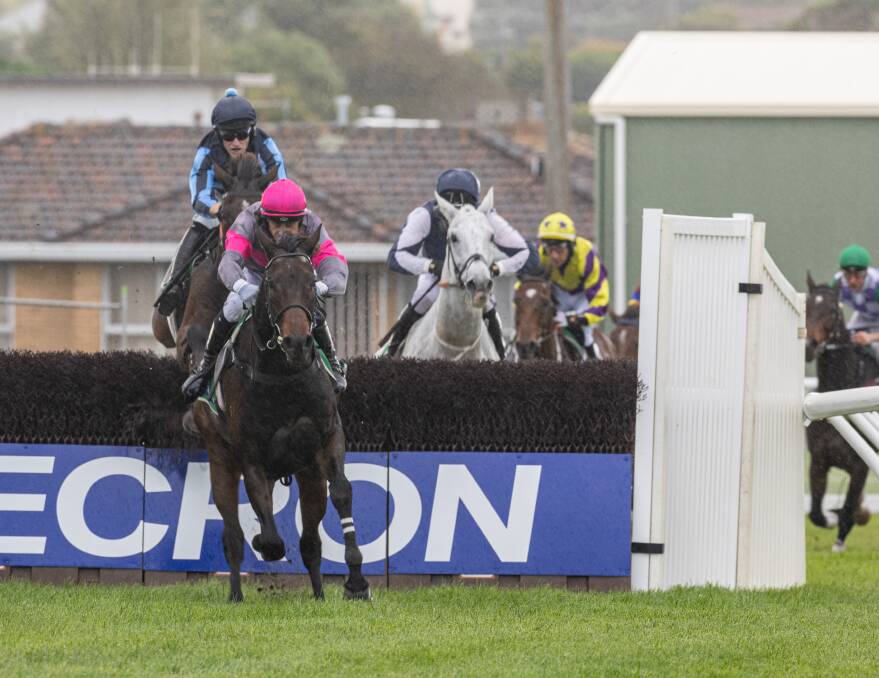Britannicus and jockey Aaron Kuru clear a hurdle on the way to winning the Brierly Steeplechase on Tuesday. Picture by Sean McKenna.