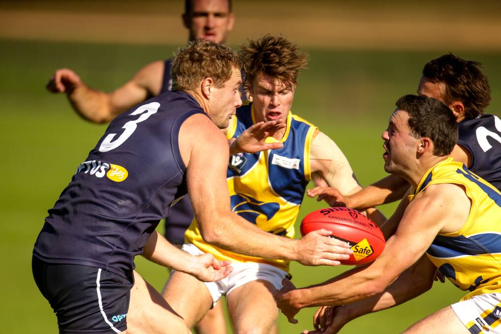 CONTESTED: Warrnambool's James Chittick attacks the contest on Saturday. Picture: Chris Doheny