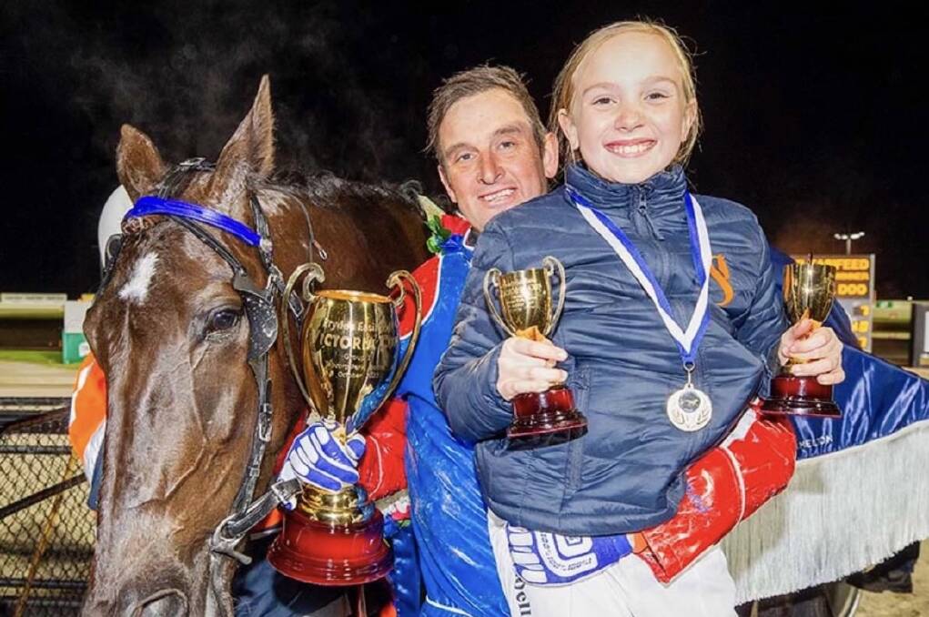Michael Stanley, with daughter Annabelle and stable star Rock N Roll Doo after winning last month's Victoria Cup. Picture supplied.