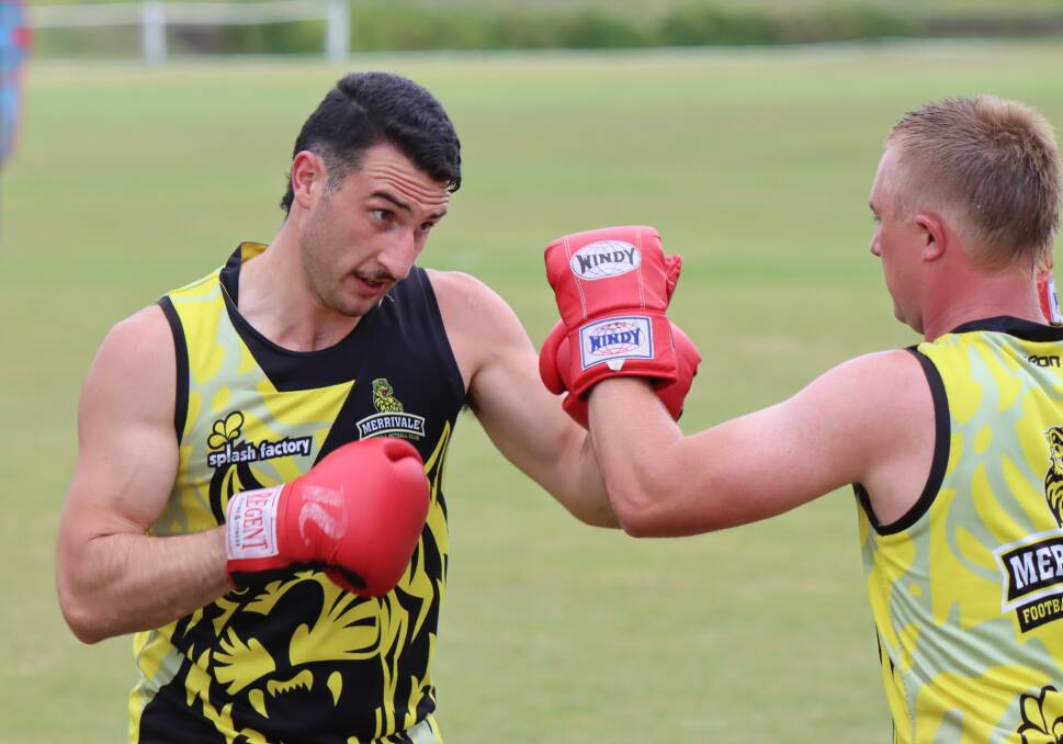 PACKS A PUNCH: Merrivale's Michael Boyd and Nathan Krepp power through a boxing drill during Wednesday's pre-season session. Picture: Justine McCullagh-Beasy