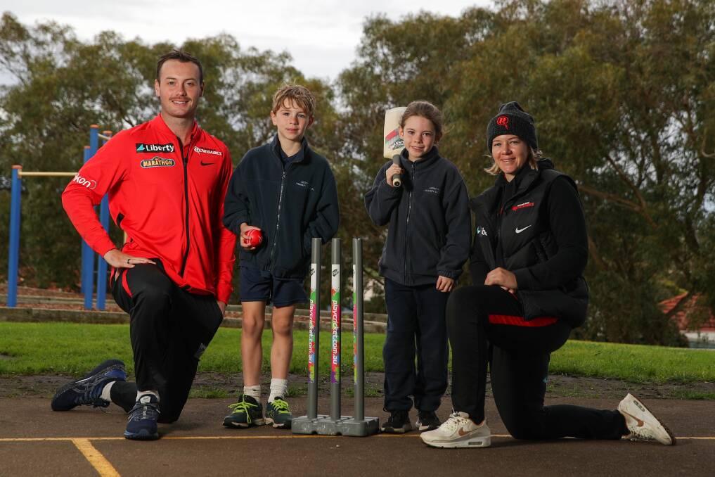 A BLAST: Melbourne Renegades players Zak Evans (left) and Rhiann O'Donnell (right) with Merrivale Primary School students Humphrey Horwill, 7, and Cassia Adriaanse, 7 on Monday. Picture: Morgan Hancock