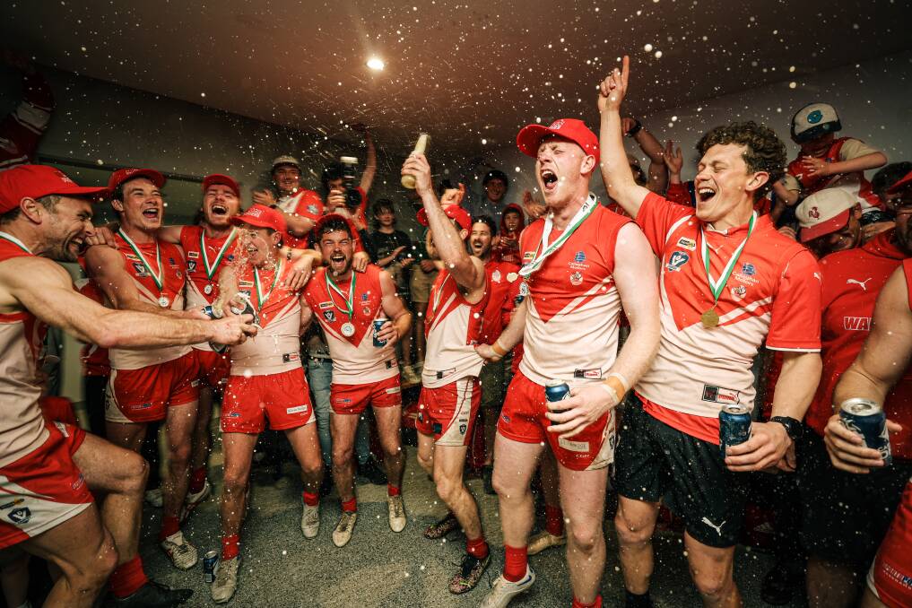 South Warrnambool celebrates in the rooms post-premiership win. Picture by Sean McKenna