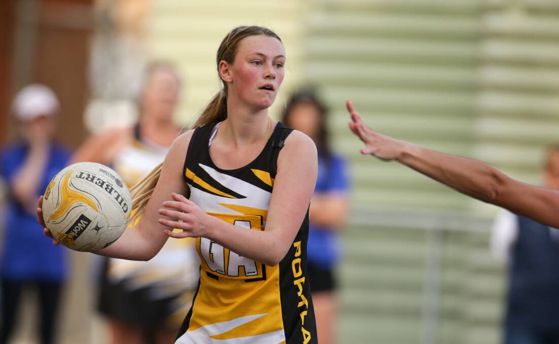 EYES UP: Portland's Heidi Jones works the ball into the Tigers' attack on Monday. Picture: Chris Doheny
