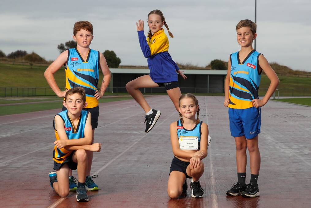 YOUNG GUNS: (left to right): Harrison Watson, 8, Lenny Ryan, 10, Sophie Burrows, 11, Chloe Burrows, 9, and Callum Wade, 11 are preparing for the State Track and Field Championships. Picture: Morgan Hancock
