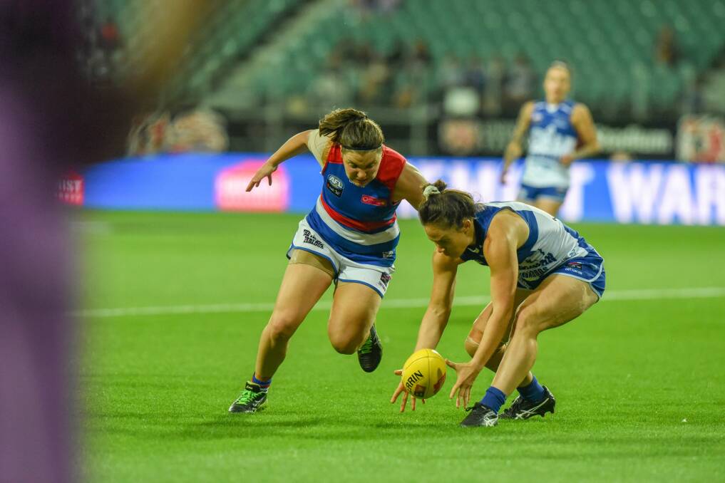 Emma Kearney (right) has captained North Melbourne since 2019. File picture