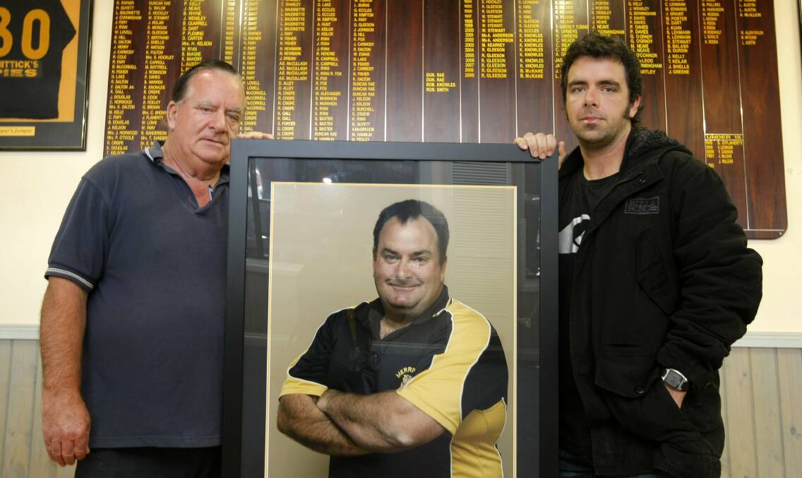 HONOUR: Jack Kelson Sr and Jade Kelson with a photo of the late Stephen Kelson in 2012.