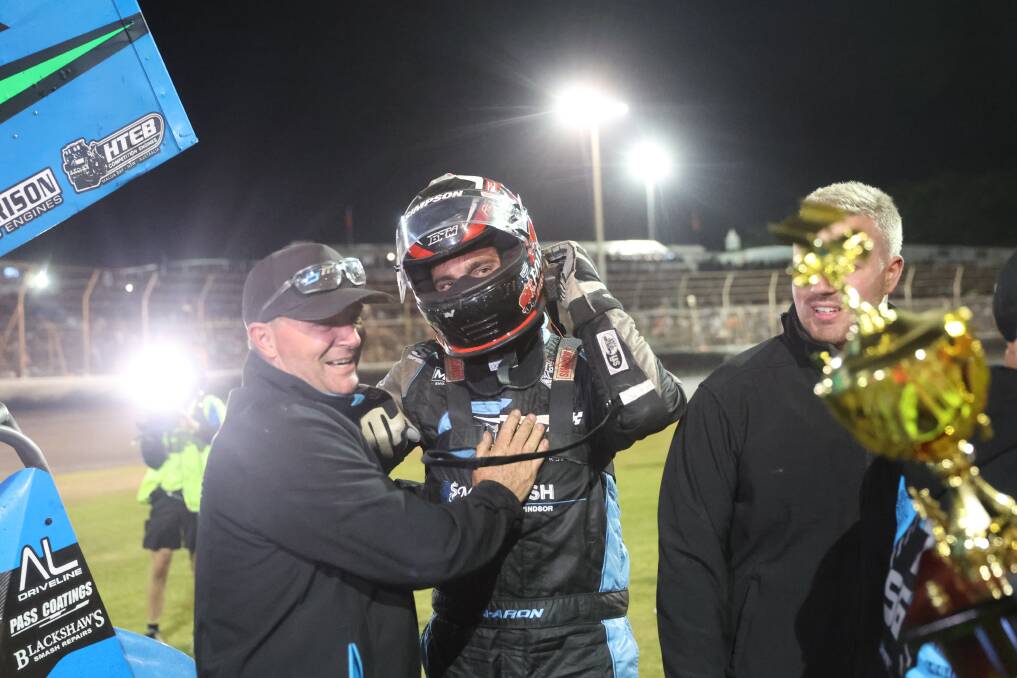 Aaron Reutzel (middle) soaks in winning the 51st Grand Annual Sprintcar Classic. Picture by Eddie Guerrero.