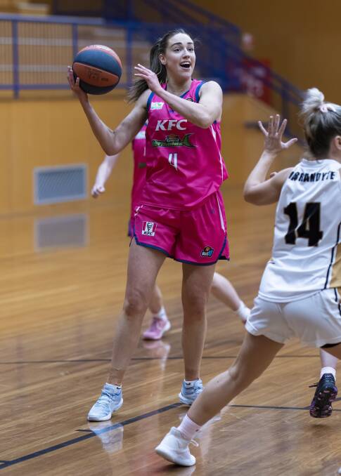 Amy Wormald and the Mermaids trade their green kit for pink during Big V's Pink Round. Picture by Larry Lawson