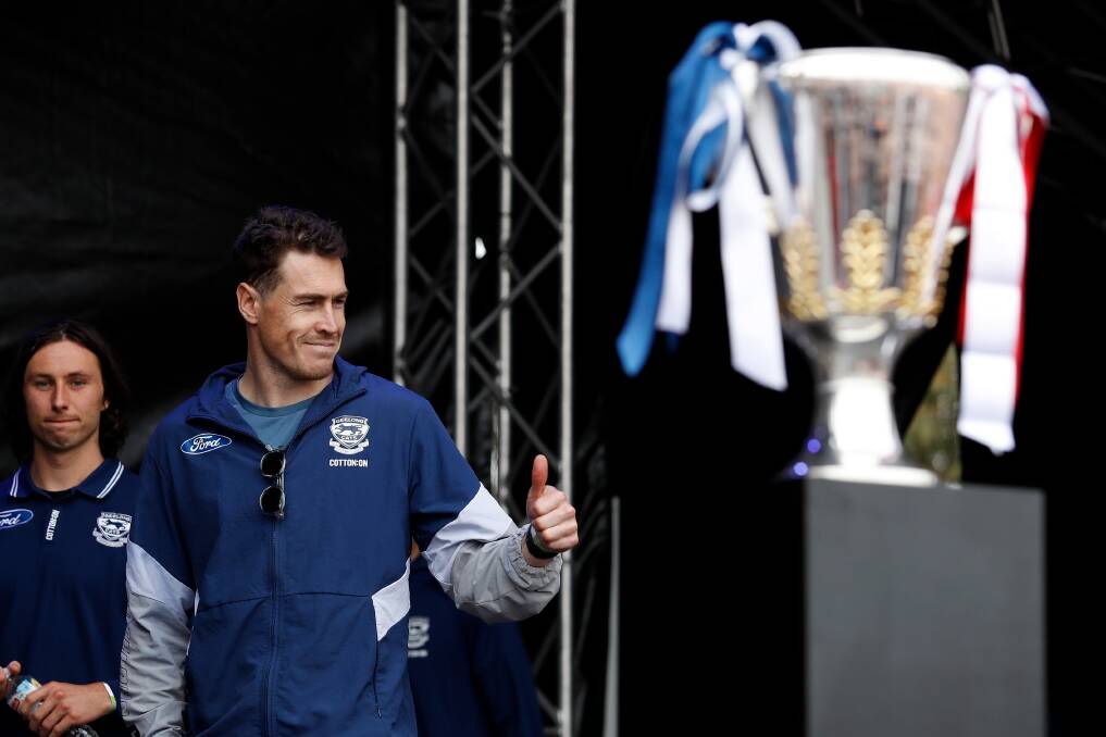 Dartmoor's Jeremy Cameron arrives on stage at the AFL grand final parade in Melbourne, where the premiership cup was in sight. Picture by Getty Images