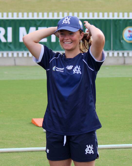 Port Campbell teenager Milly Illingworth receives her Victorian cap on Friday morning. Picture by Cricket Victoria