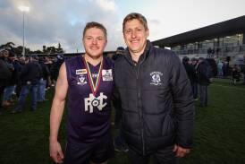 Nirranda captain Reagan Nutting and coach Nick Couch enjoy the celebrations after the win. Picture by Sean McKenna