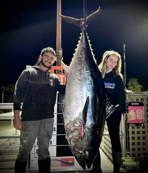 James Cauchi and Ashby Hoey show off their 147kg catch.