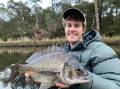 Tim Vincent with a bream he caught last week. Pictures supplied