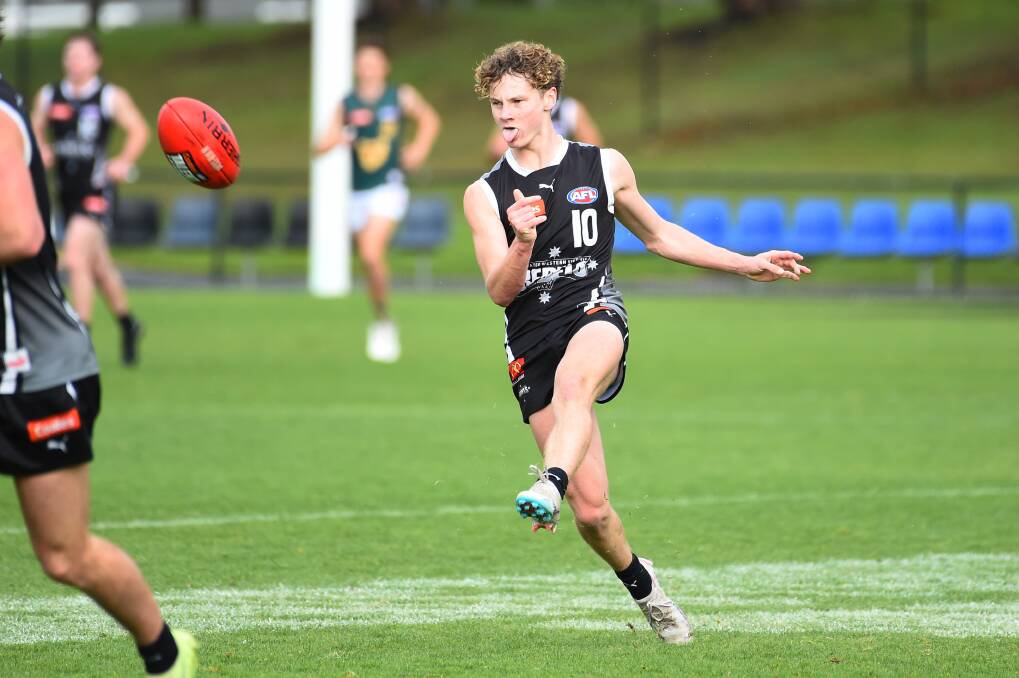 Rhys Unwin gets his kick away against the Tasmanian Devils in the Coates Talent League on Sunday in Ballarat. Picture by Kate Healy