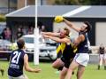 Manny Sandow and Mathew Lloyd compete for the footy at Merrivale. Pictures by Anthony Brady