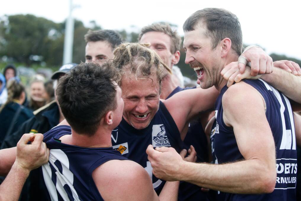 The Nirranda players are full of delight after clinching the WDFNL senior flag. Picture by Anthony Brady