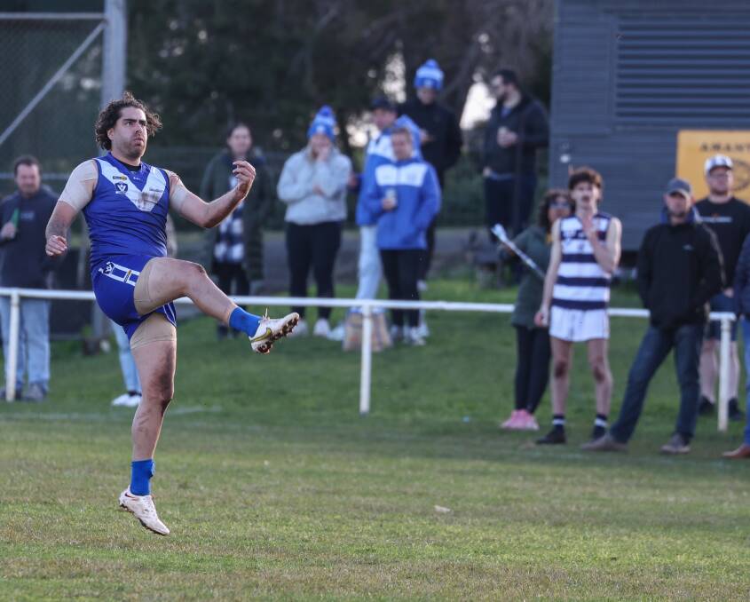 Russells Creek's Lachlan Edwards kicks for goal against Allansford on Saturday. Picture by Sean McKenna