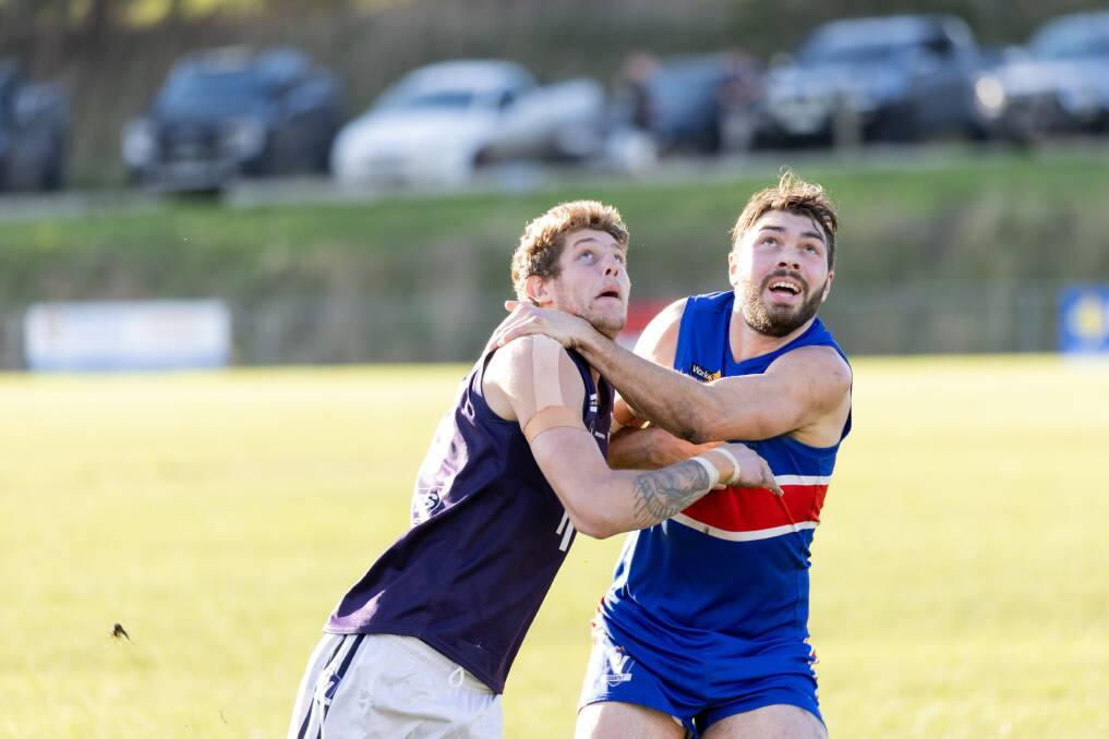 Nirranda's Jarryd Walsh and Panmure's Rylan Rattley contest the ruck on Saturday. Picture by Anthony Brady
