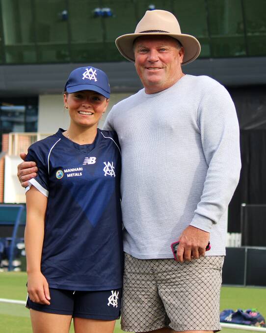 Milly Illingworth and dad Simon during the cap presentation on Friday. Picture by Victoria