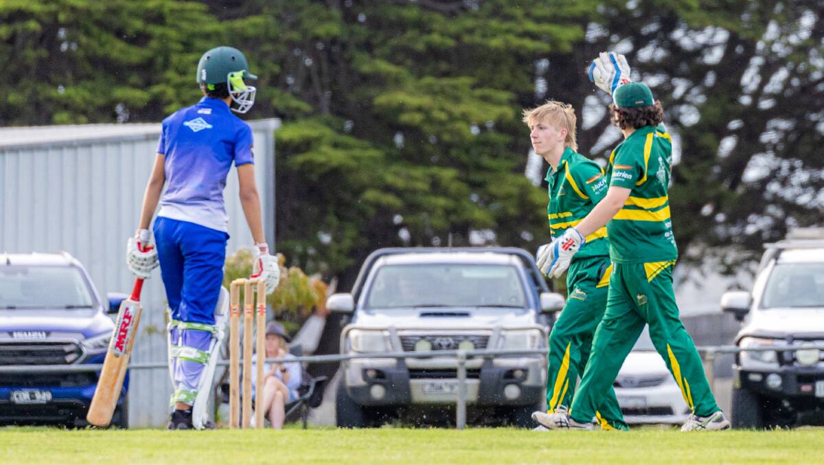 Lachlan Rea (middle) celebrates a wicket for Allansford-Panmure. Picture by Sean McKenna