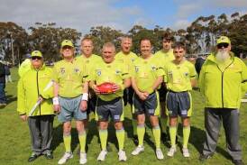 Steve Blacker, pictured with the football, is umpiring his 150th match on Saturday. Picture by Tracey Kruger
