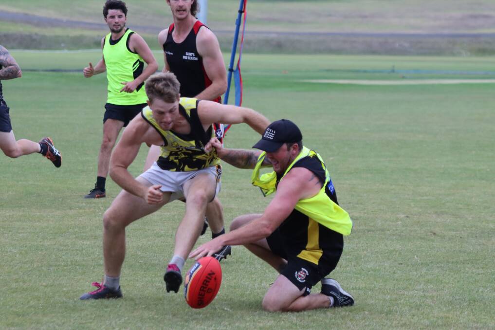 FITTING IN: Merrivale recruit Colby Rix (right) battles for the football at training recently. Picture: Justine McCullagh-Beasy