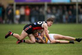 Koroit's Connor Byrne lays a crunching tackle during the 2022 Hampden league grand final. File picture